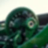 Detailed view of a green baler component showcasing its engineering design