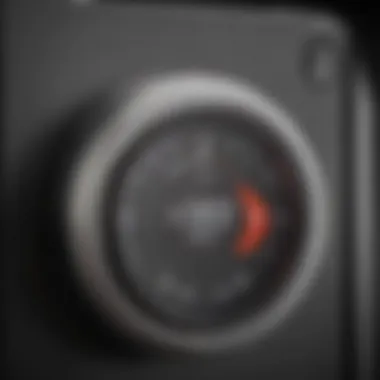 Detailed view of the thermostat control on an electric heater