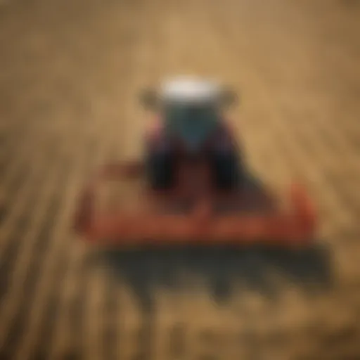 A used rotary rake in action, efficiently gathering hay in a field.