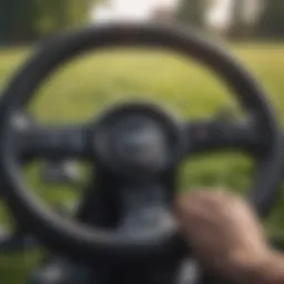 Close-up view of a zero turn mower steering wheel