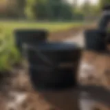 Durable black rubber bucket in agricultural setting