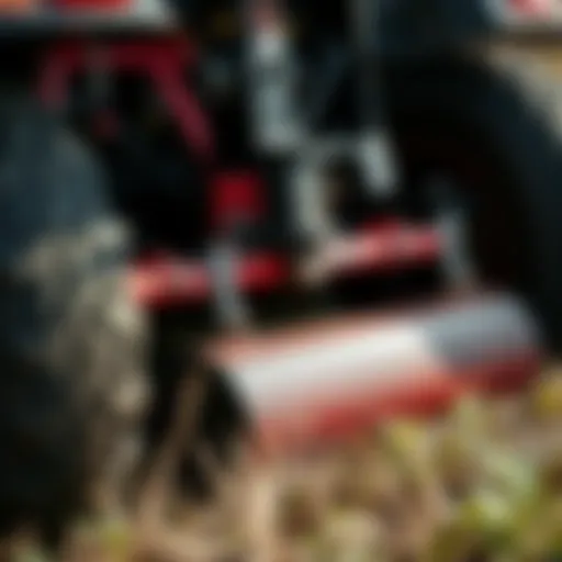 Close-up of a tilling attachment on a riding mower