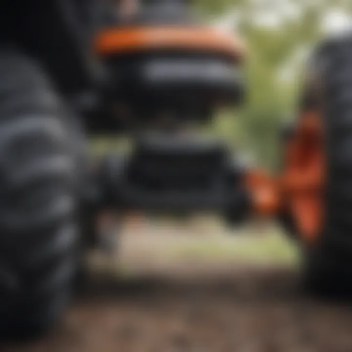 Close-up view of the suspension system of a zero turn mower
