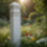 A close-up view of white post covers in a vibrant garden setting